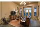 Relaxing living room with comfortable seating, stylish decor, and a view of the desert scenery at 23014 N 52Nd St, Phoenix, AZ 85054