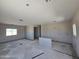 Open living room with unfinished floors, offering a blank canvas for customization at 26308 W Camino Del Sol --, Casa Grande, AZ 85193