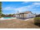 Spacious backyard with pool, patio, and lush green grass, perfect for outdoor entertaining at 2640 E Mallory St, Mesa, AZ 85213