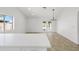 Bright kitchen featuring white countertops and tiled floors and a view of the backyard and pool at 2640 E Mallory St, Mesa, AZ 85213