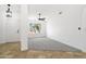 An inviting living area featuring carpet, tile floors, and ample natural light at 2640 E Mallory St, Mesa, AZ 85213