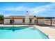 Large backyard with a sparkling blue pool and ample space for entertaining at 2640 E Mallory St, Mesa, AZ 85213