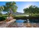 Stunning pool with scenic views of the golf course and desert mountains, perfect for relaxing in a tranquil setting at 27050 N 103Rd St, Scottsdale, AZ 85262