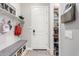 Convenient mudroom with seating and storage near entrance at 30857 N 128Th Dr, Peoria, AZ 85383