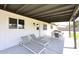 Enjoy the back patio with seating and lounging areas, perfect for entertaining at 325 W San Angelo St, Gilbert, AZ 85233