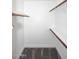 Bright walk-in closet features built-in shelving and rods for optimal organization at 325 W San Angelo St, Gilbert, AZ 85233