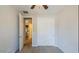 Clean bedroom featuring carpet, a closet with slider doors, and easy access to the hallway at 3386 E Strawberry Dr, Gilbert, AZ 85298