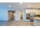 Open-concept floor plan showcases stylish tile flooring and easy access to the modern kitchen at 3386 E Strawberry Dr, Gilbert, AZ 85298