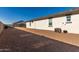 Spacious backyard featuring desert landscaping, and exterior view of home at 36204 W San Sisto Ave, Maricopa, AZ 85138