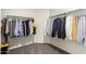 Spacious walk-in closet with ample hanging space for clothing and organized storage solutions at 36204 W San Sisto Ave, Maricopa, AZ 85138