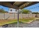 Private backyard featuring a tall block wall, mature trees, and covered patio perfect for outdoor living at 3732 W Bluefield Ave, Glendale, AZ 85308