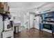 Modern kitchen showcasing blue cabinets, wooden floors, stainless steel appliances, and ample countertop space at 3732 W Bluefield Ave, Glendale, AZ 85308