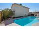 A spacious backyard pool with clear blue water and a basketball hoop for added entertainment at 3732 W Bluefield Ave, Glendale, AZ 85308
