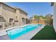 Inviting backyard pool with steps and shallow area, set against a backdrop of lush green turf at 3732 W Bluefield Ave, Glendale, AZ 85308