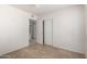 Bright bedroom with tile flooring, closet and access to bathroom at 3828 W Crocus Dr, Phoenix, AZ 85053