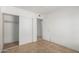 Bedroom featuring closet space and tile flooring at 3828 W Crocus Dr, Phoenix, AZ 85053