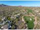 Scenic aerial view of luxury homes nestled within the golf course community and mountain views at 39541 N 107Th Way, Scottsdale, AZ 85262