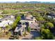 Expansive aerial view of property showcasing desert landscaping, golf course, and mountain views at 39541 N 107Th Way, Scottsdale, AZ 85262