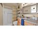 Bright bathroom with a shower, vanity, and storage at 4034 E Aster Dr, Phoenix, AZ 85032