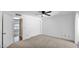 Spacious bedroom with carpet, ceiling fan, and closet space at 4034 E Aster Dr, Phoenix, AZ 85032