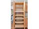 Kitchen cabinets with pull-out shelves maximize storage, offering convenience and organization at 4034 E Aster Dr, Phoenix, AZ 85032
