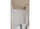 Clean, white shower featuring built-in seat and modern fixtures at 4034 E Aster Dr, Phoenix, AZ 85032