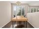 Dining area with modern table and chairs near bright windows at 420 W First St # 217, Tempe, AZ 85281
