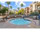 Inviting hot tub surrounded by comfortable seating and lush landscaping for relaxation at 420 W First St # 217, Tempe, AZ 85281