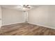 Bedroom featuring wood flooring and neutral walls at 4501 E Carol Ave # 68, Mesa, AZ 85206