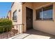 Close up of entrance with security door, railing, and a window showing an outside view at 4501 E Carol Ave # 68, Mesa, AZ 85206