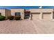 Charming single-story home with a two-car garage and low-maintenance desert landscaping for easy care at 4501 E Carol Ave # 68, Mesa, AZ 85206