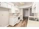 Bright kitchen with white cabinets, modern appliances, and plenty of counter space at 4501 E Carol Ave # 68, Mesa, AZ 85206