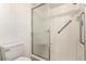 A clean, bright bathroom shower with grab bars for added safety and accessibility at 4501 E Carol Ave # 68, Mesa, AZ 85206