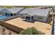 Spacious backyard with privacy wall and covered patio, ready for landscaping or a pool at 4619 N 179Th Dr, Goodyear, AZ 85395