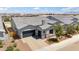 Charming single-Gathering home featuring desert landscaping, neutral tones, stone accents and a two-car garage at 4619 N 179Th Dr, Goodyear, AZ 85395