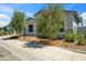 Well maintained single-story home with stone accents, desert landscaping, and a sidewalk in front at 4619 N 179Th Dr, Goodyear, AZ 85395