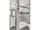 Recently renovated bathroom with a shower, mosaic tile accents, and modern sink at 4735 S Mill Ave, Tempe, AZ 85282