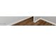 Wood-look tile flooring is laid in a diagonal pattern with white baseboards at 4735 S Mill Ave, Tempe, AZ 85282