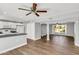 Open-concept home features a living room connected to the kitchen and dining area at 4735 S Mill Ave, Tempe, AZ 85282