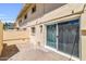 Small private outdoor patio with access through a sliding glass door at 4735 S Mill Ave, Tempe, AZ 85282