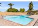 Outdoor community pool with brick surround, metal ladders, and clear blue water at 4735 S Mill Ave, Tempe, AZ 85282