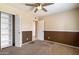 Bedroom featuring closet, carpeting, paint and entry to bathroom at 5337 W Diana Ave, Glendale, AZ 85302
