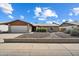Charming single-story home featuring a two-car garage, manicured landscaping, and a welcoming facade at 5337 W Diana Ave, Glendale, AZ 85302