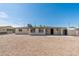 A gravel backyard with a utility shed on a sunny day at 5452 E University Dr, Mesa, AZ 85205