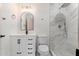 Bathroom featuring a new vanity, modern fixtures, and tiled walk-in shower at 5452 E University Dr, Mesa, AZ 85205