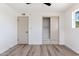 Bedroom featuring a spacious closet and natural light at 5452 E University Dr, Mesa, AZ 85205
