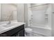 A bathroom featuring a single sink, bathtub and shower combination at 5752 N 109Th Ave, Phoenix, AZ 85037