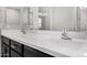 Bathroom featuring a double sink vanity and large mirror at 5752 N 109Th Ave, Phoenix, AZ 85037