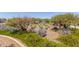 View of a community greenbelt with desert vegetation and landscaping in the surrounding area at 5752 N 109Th Ave, Phoenix, AZ 85037
