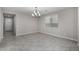 Spacious living room featuring tile floors and natural light at 5752 N 109Th Ave, Phoenix, AZ 85037